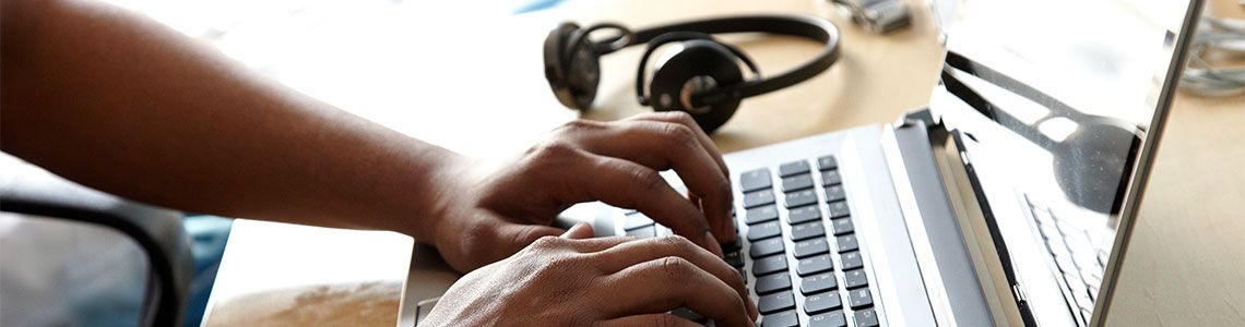 https://www.arucollege.com/wp-content/uploads/2020/05/Student-typing-on-a-laptop.jpg.optimal.jpg